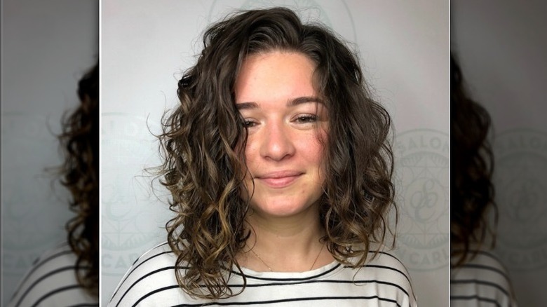 person with curly hair