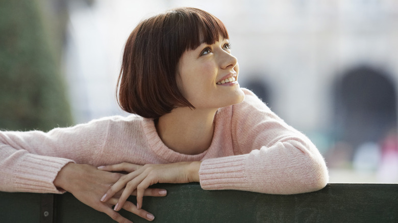 Person smiling with french bob