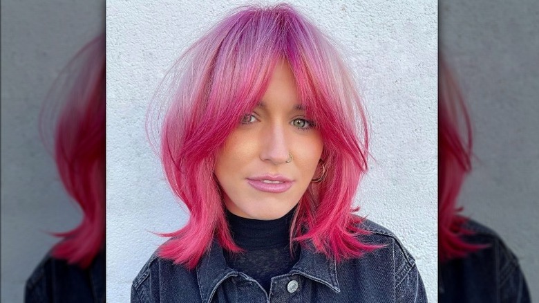 person with pink shag haircut