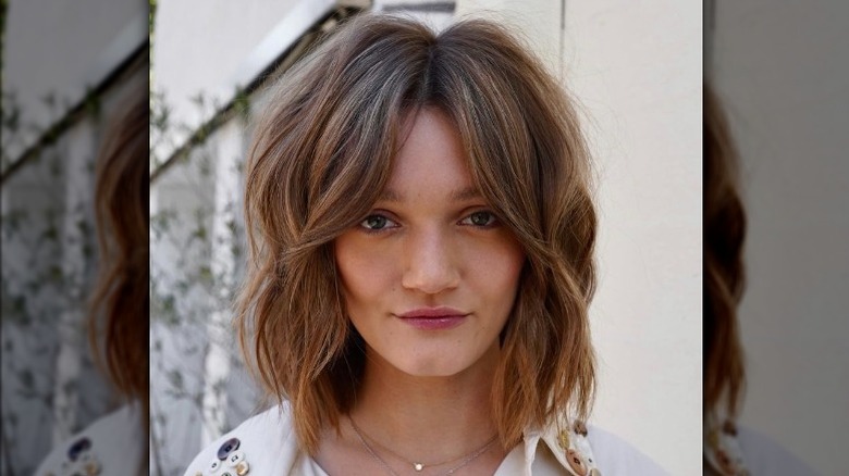 woman with curtain bangs