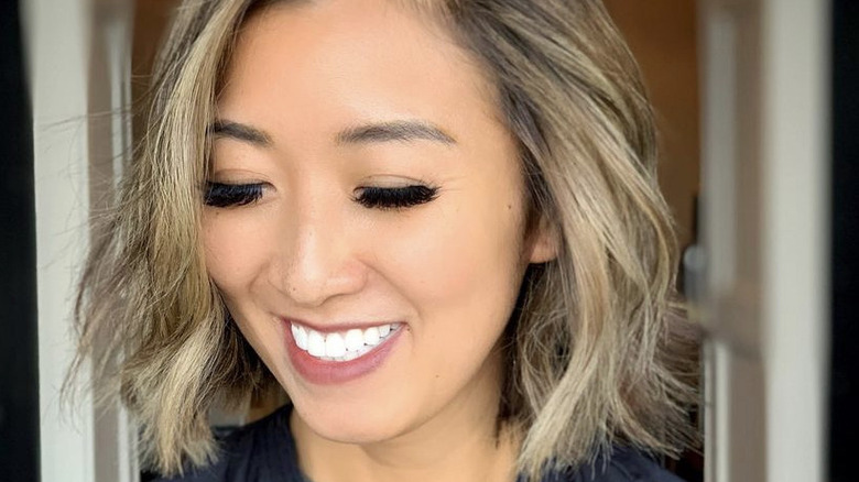 woman with wavy bob smiling