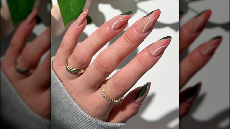 manicure with pink and green curves