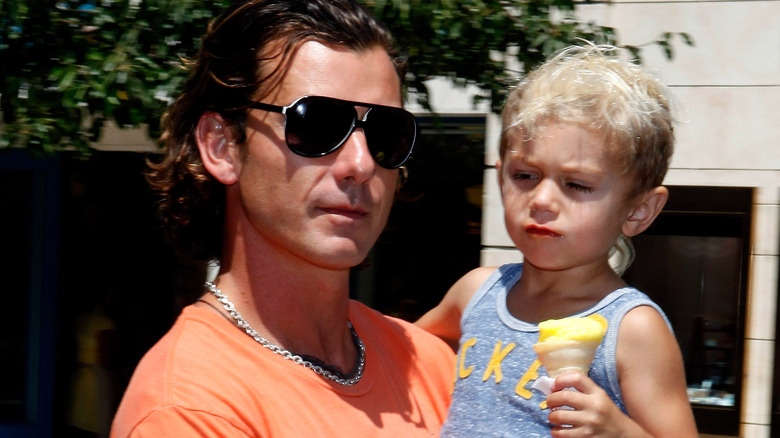 Gavin Rossdale holding his son 