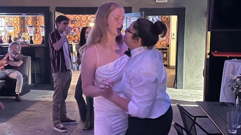 Gwendlyn Brown dancing with her wife Beatriz at their wedding