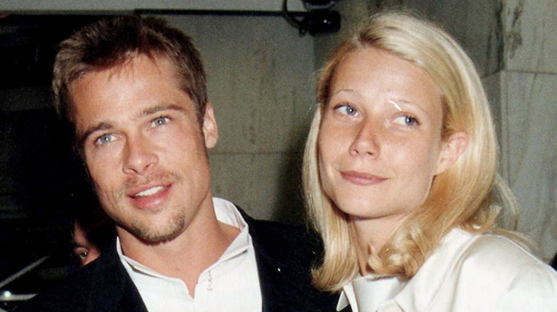 Brad Pitt and girlfriend Gwyneth Paltrow attend the "Legends Of The Fall" UK Premiere after party at Kensington Roof Gardens in London (1995)