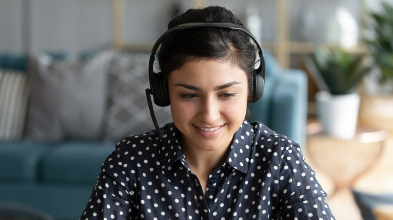 a woman with headphones on