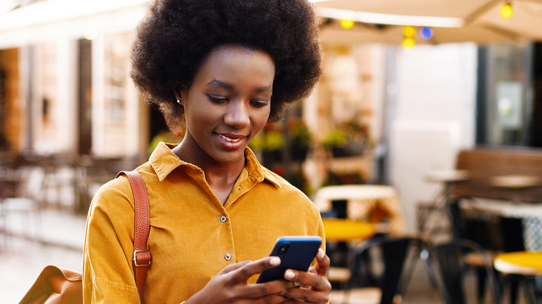 a woman checking her phone