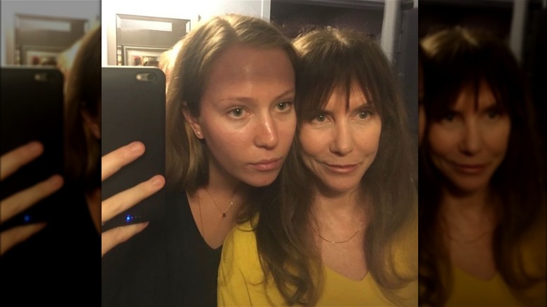 Hannah Einbinder and Laraine Newman in mirror selfie, cheek to cheek.