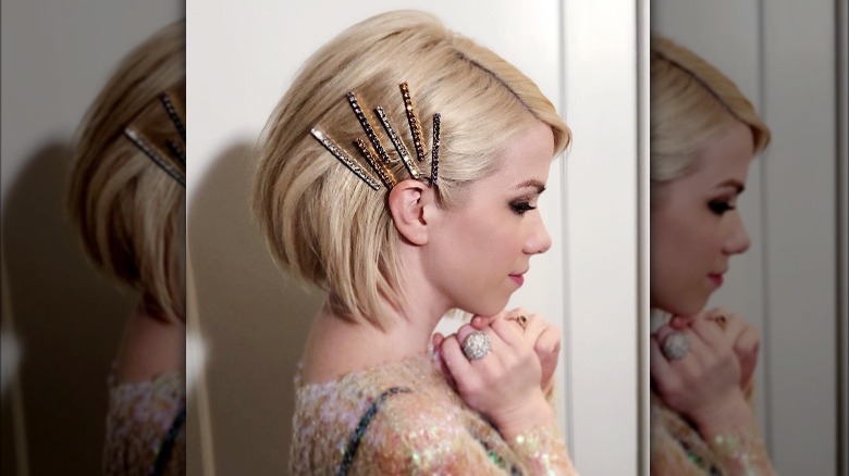 Singer Carly Rae Jepsen wearing multiple sparkly bar clips