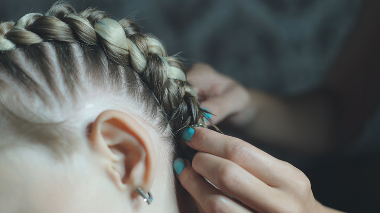 Boxer braids, a hair trend of the 2010s