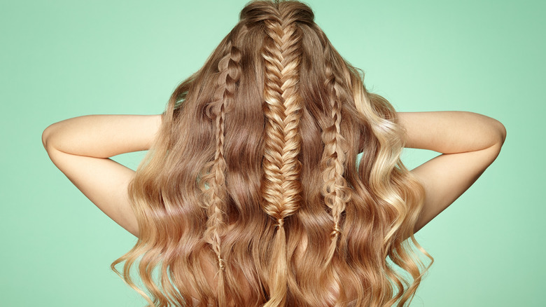 A blonde with fishtail braids