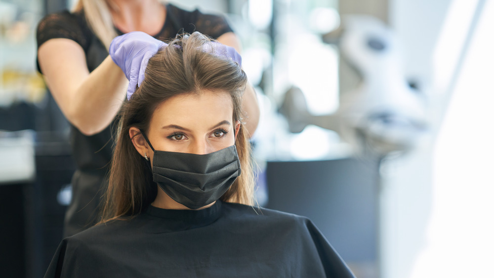 Woman getting a haircut