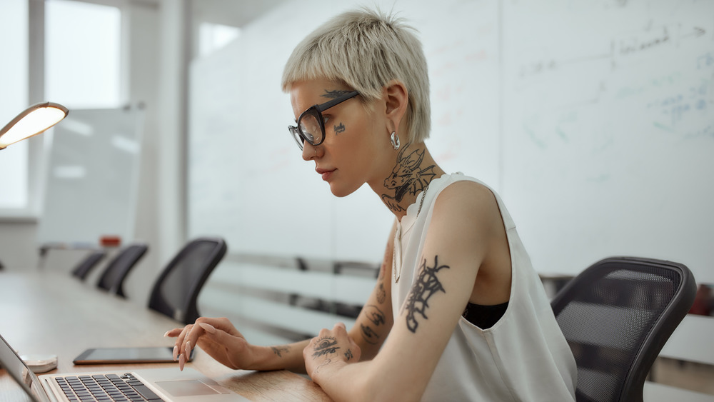 A woman with a crop haircut