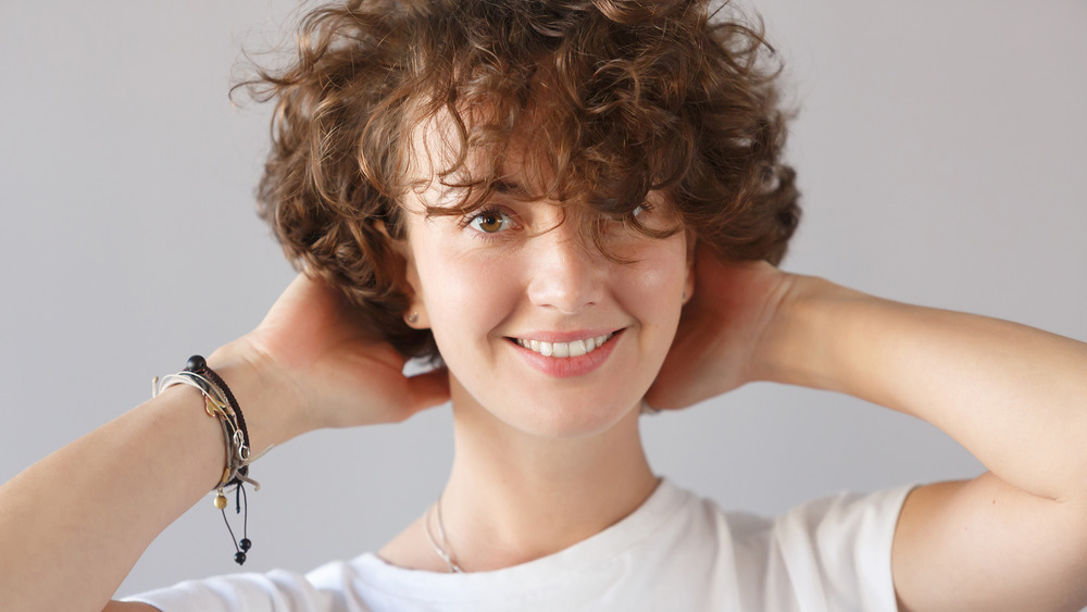 A woman with wispy bangs