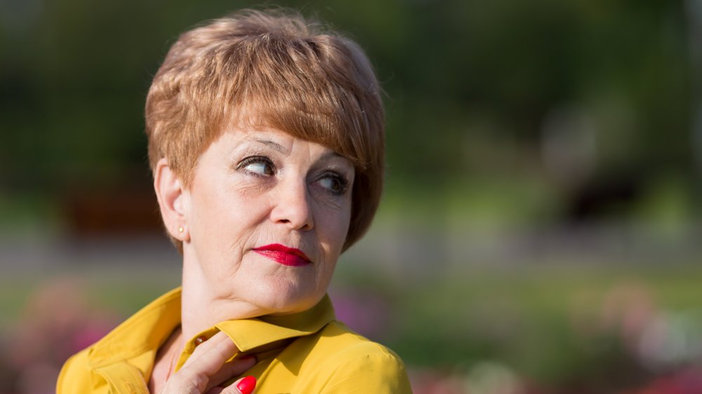 Older woman with helmet-shaped haircut