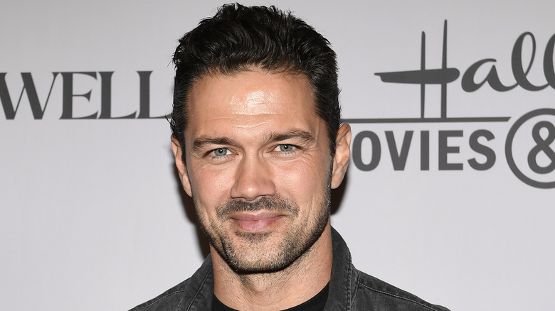 Ryan Paevey smiling