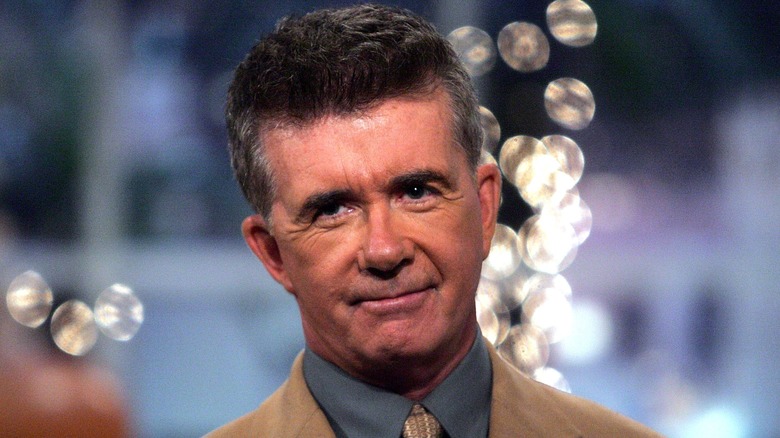 Alan Thicke smiling on set