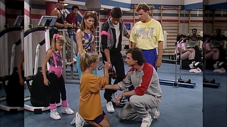 Screen grab of the Tanner family at the gym on "Full House"