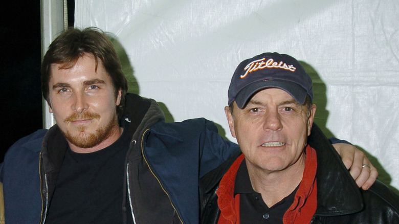 Christian Bale and Michael Ironside posing together