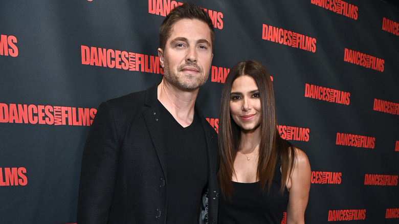 Eric Winter and Roselyn Sánchez smiling