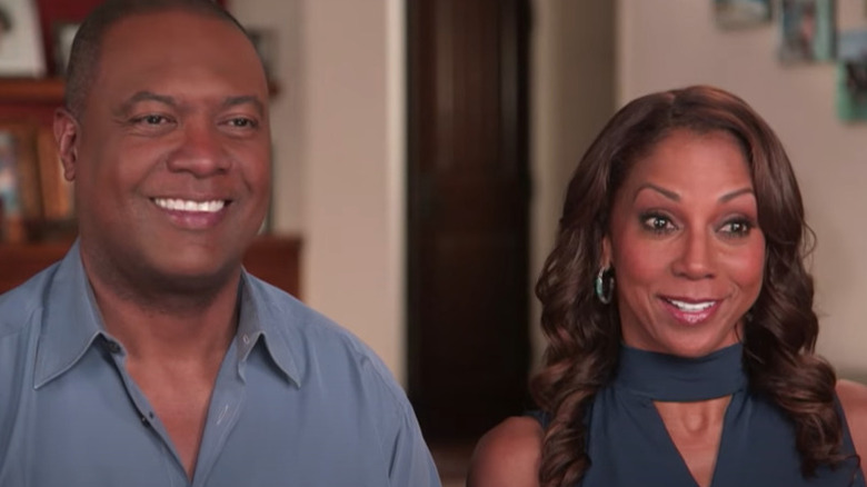 Holly Robinson Peete and Rodney Peete smiling