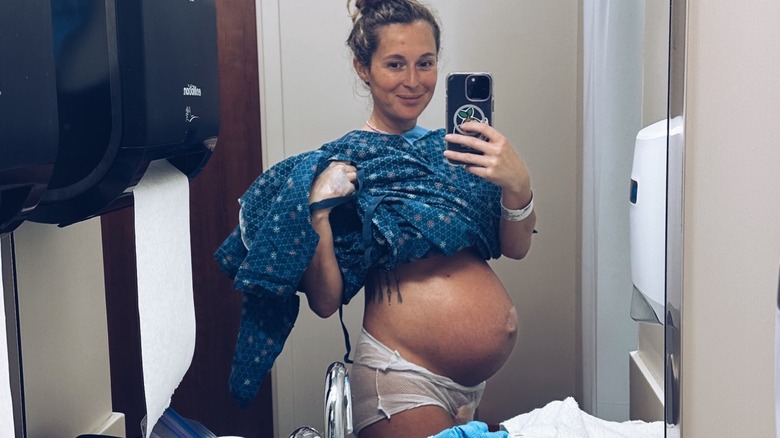 Alexa PenaVega mirror selfie pregnancy bump