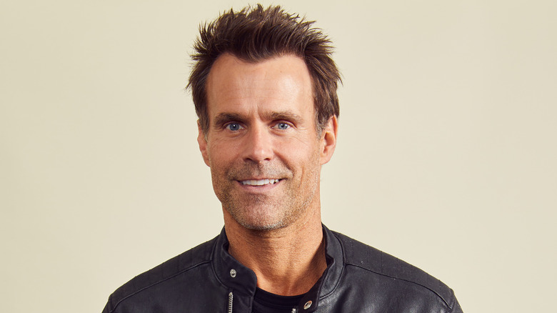 Cameron Mathison smiling into camera