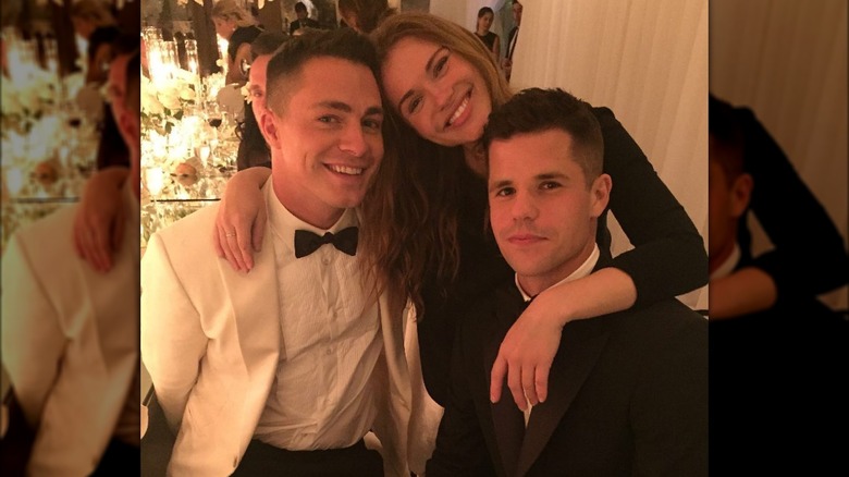 Colton Haynes, Holland Roden, and Charlie Carver posing