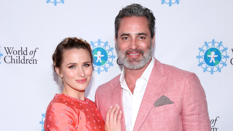 Victor Webster & Shantel VanSanten posing