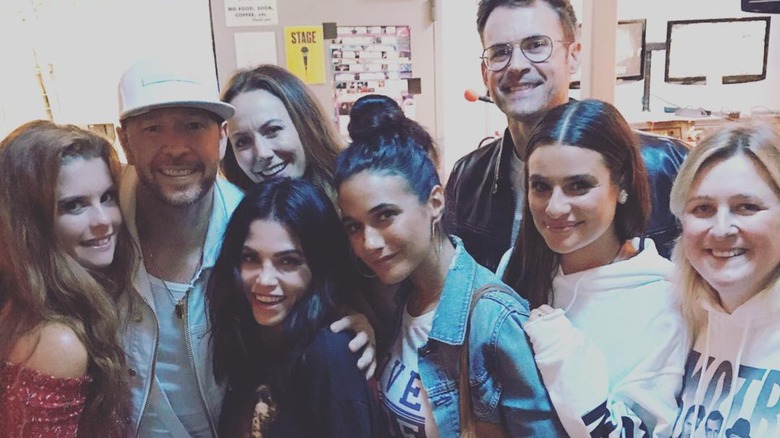 JoAnna Garcia Swisher, Donnie Wahlberg, Jenna Dewan, Lea Michele, and friends smiling.