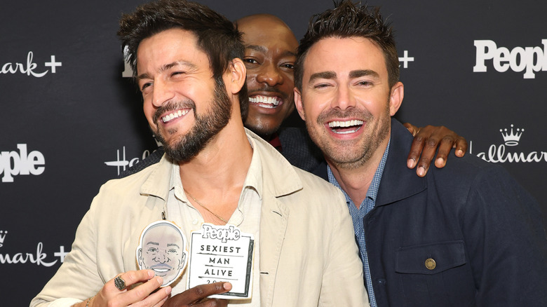 Tyler Hynes, B.J. Britt, and Jonathan Bennett goofing off on the red carpet