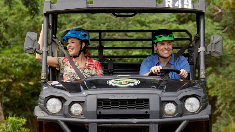 Pascale Hutton and Kavan Smith in an UTV