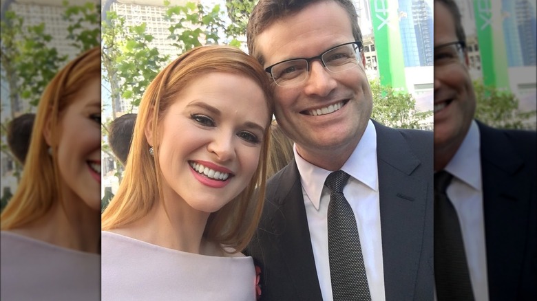 Sarah Drew and Peter Lanfer smiling