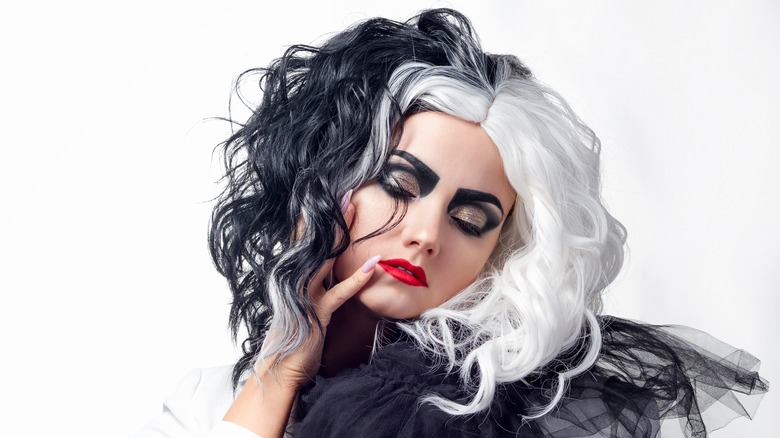 Woman dressed as Cruella De Vil