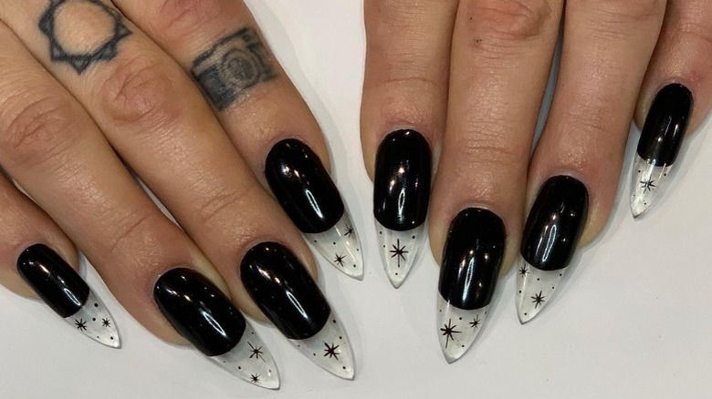 Woman showing off halloween nails