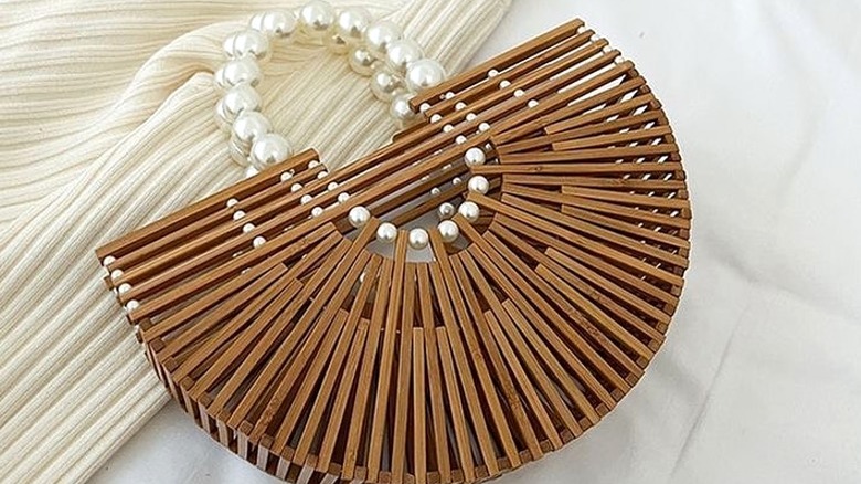 Basket-style handbag with pearl handle