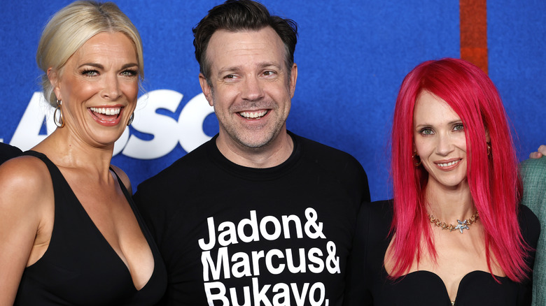 Hannah Waddingham, Jason Sudeikis, and Juno Temple posing