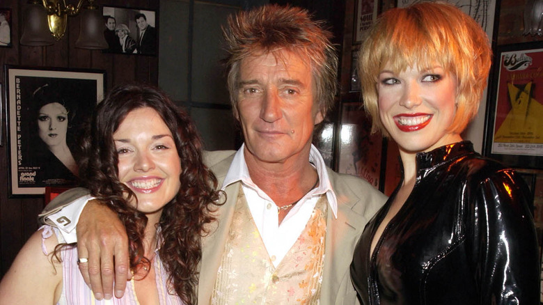 Hannah Waddingham posing with Rod Stewart and Dianne Pilkington 