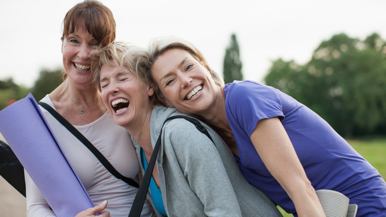 Happy friends smiling/laughing