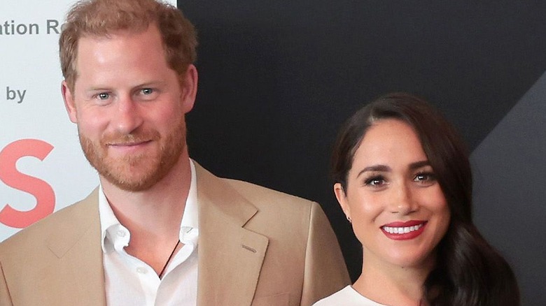 Prince Harry and Meghan Markle at press event 