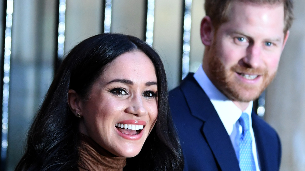 Meghan Markle and Prince Harry smiling 