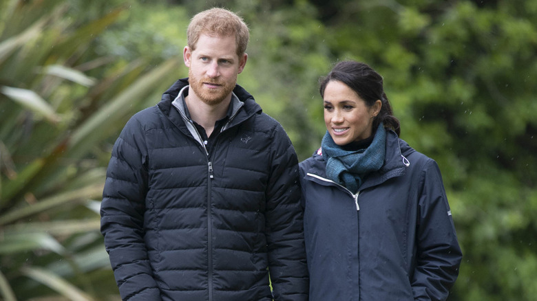 Prince Harry and Meghan Markle walking