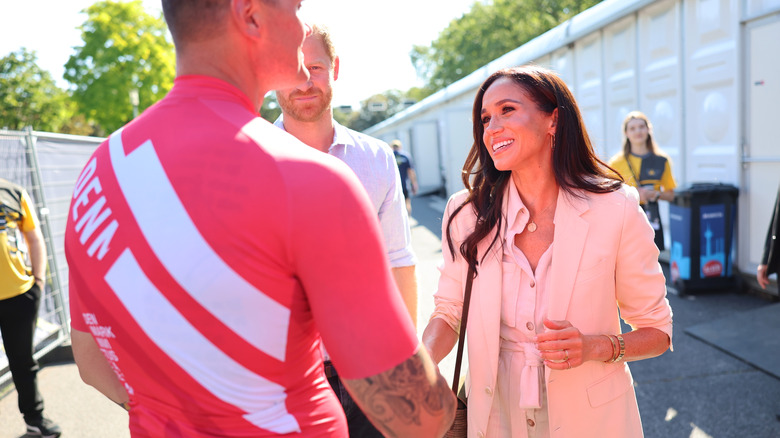 Meghan and Harry meet athlete