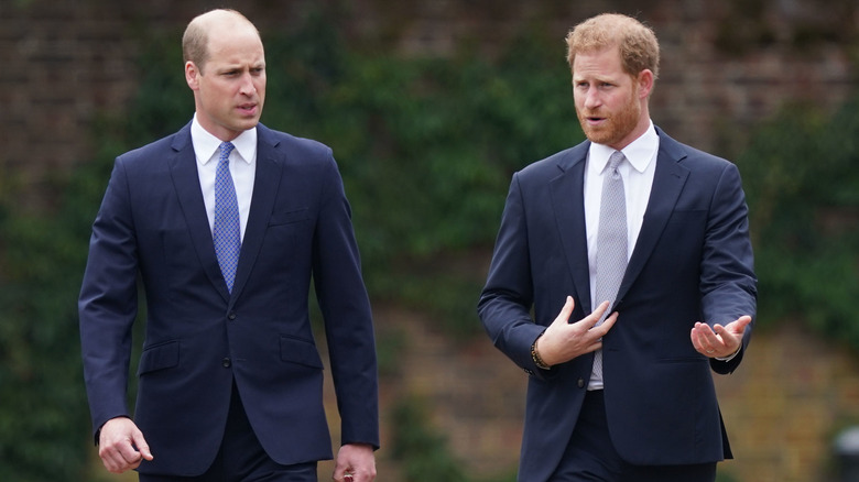 Prince William and Harry walking together at the ceremony, July 1 2021