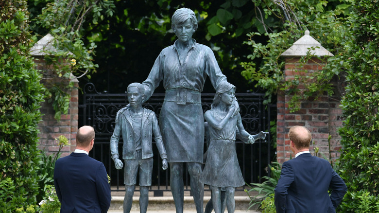 Prince William and Harry gazing at Princess Diana's statue, July 1 2021