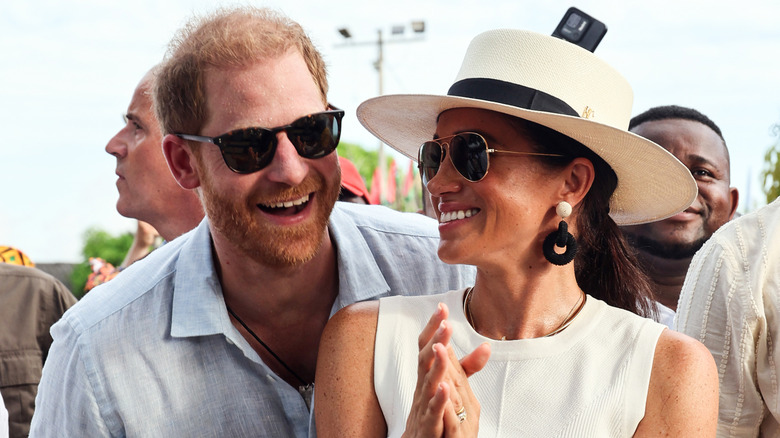 Prince Harry and Meghan Markle smiling