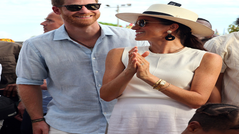 Prince harry and meghan markle smiling