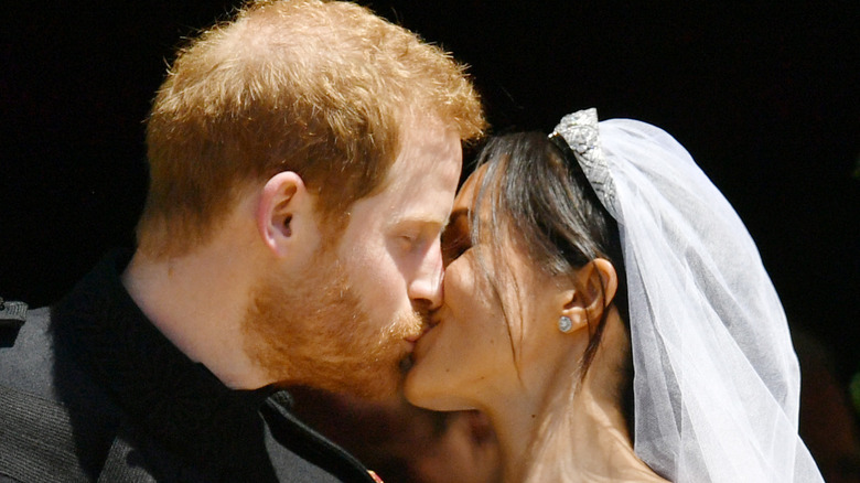 Prince Harry and Meghan Markle kiss on their wedding day