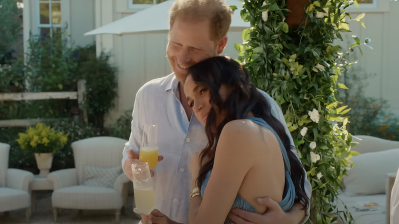 Prince Harry and Meghan cuddling on Netflix show