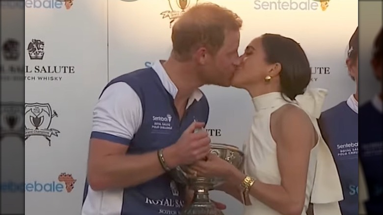 Meghan Markle and Harry kiss at charity polo event